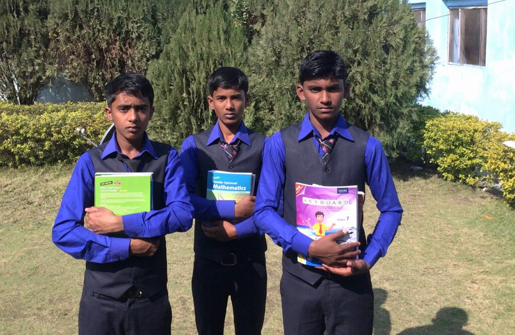Students Standing With Books